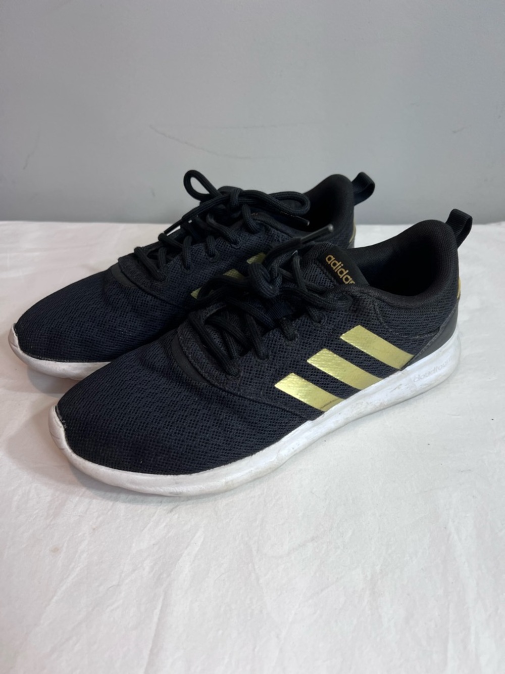 Adidas Women's QT Racer 2.0 running shoes in black and gold metallic. Size 8.5